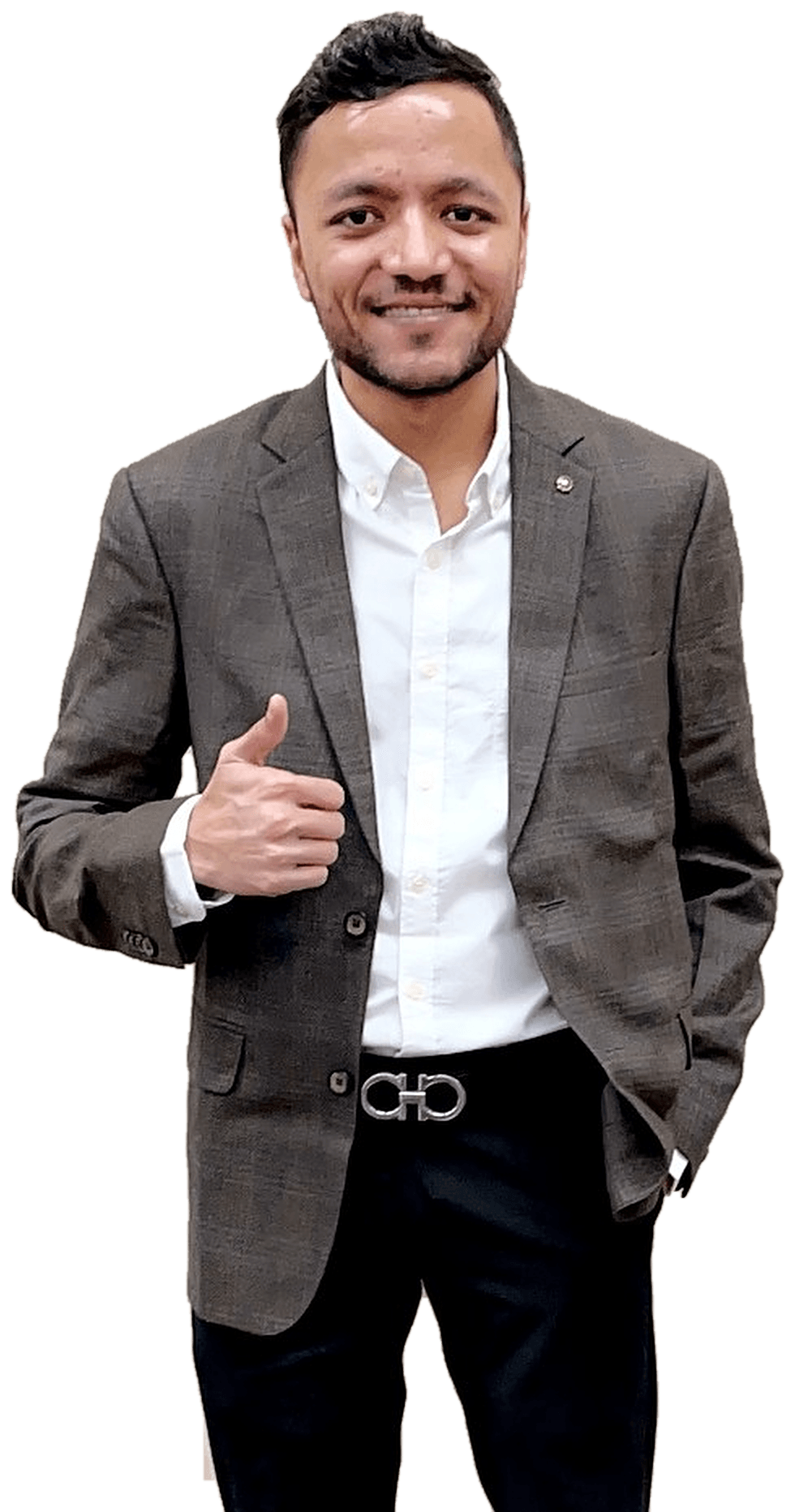 Rahul Savani in a blazer and white shirt, smiling and giving a thumbs-up